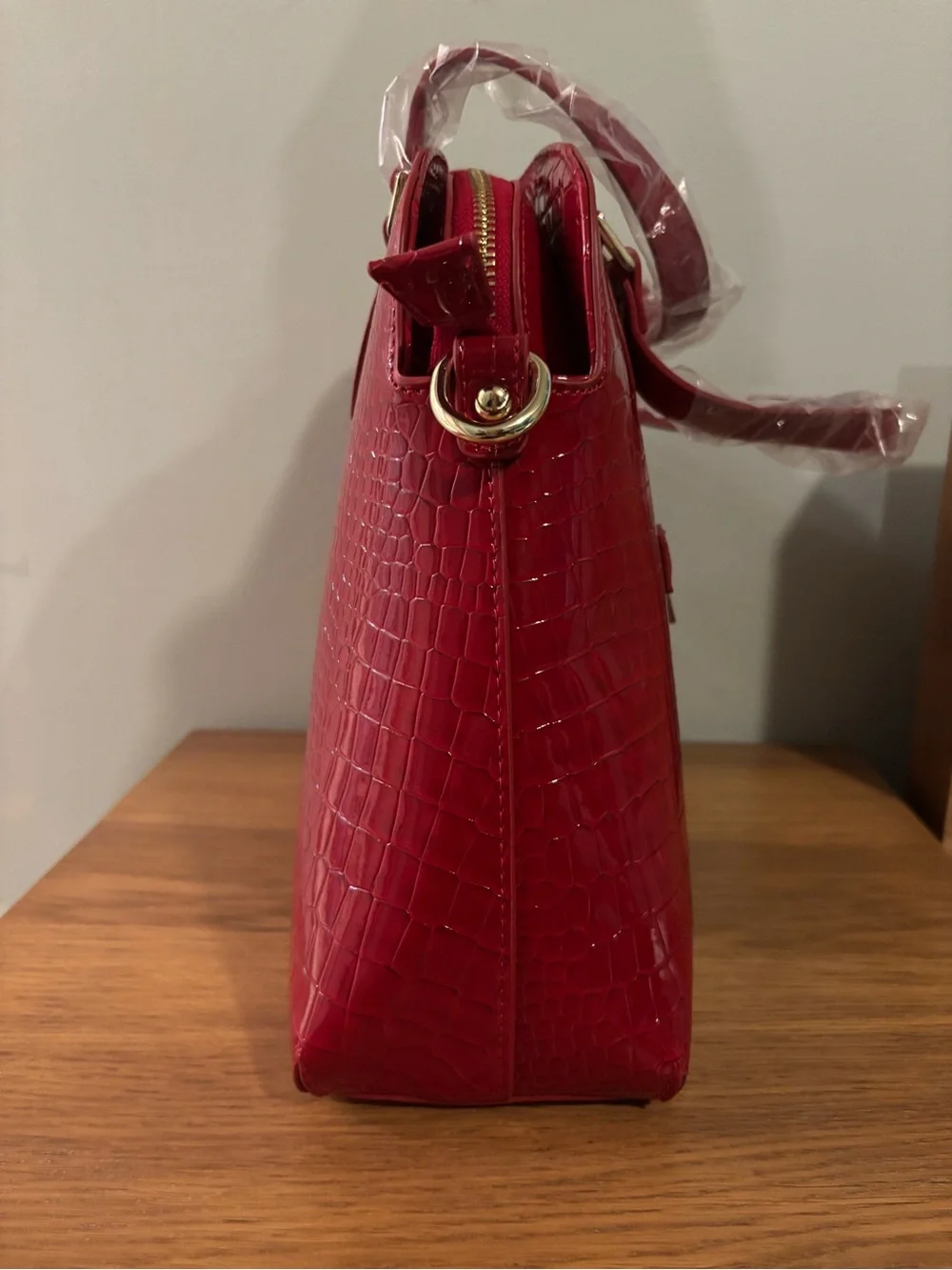 Vanessa Williams Lush round satchel vibrant red crocodile-embossed faux leather